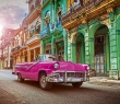 World_88G Vintage classic pink American convertible in old town of Havana Cuba